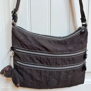 Kipling Alvar Brown Zip Crossbody Bag with Charm. 12” by 10” by 1”